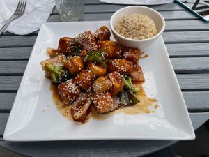 Tofu/broccoli sweet/sour dish with brown rice.  at Amituofo Vegan Cuisine in Brooklyn