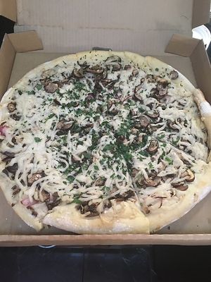 Mushroom and herb pizza with Butcher's Son cheese  at Dimond Slice Pizza in Oakland