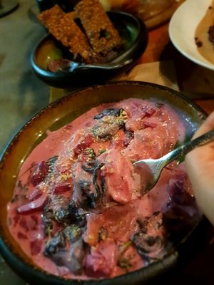 Beetroot ravioli with black garlic at Meshek Barzilay Deli in Tel Aviv