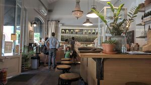 Looking at counter at Meshek Barzilay Deli in Tel Aviv