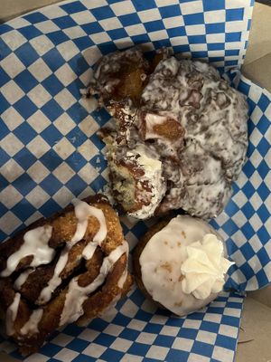 Apple fritter (our favorite!), cinnamon roll and carrot cake.   at Planted in Hamilton in Hamilton