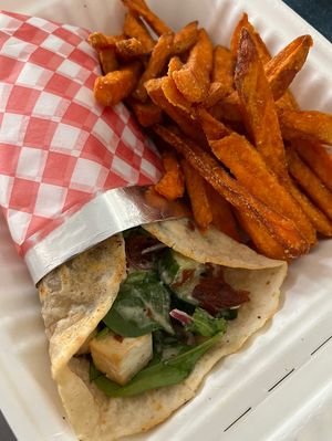 Caesar Wrap with sweet potato fries. Fabulouss  at Planted in Hamilton in Hamilton