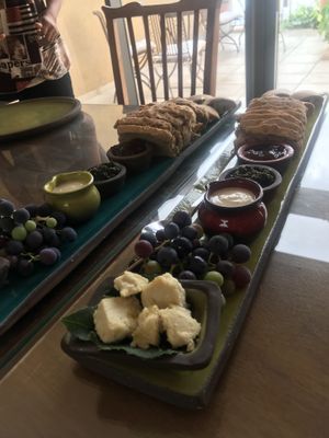 Breakfast bread and homemade “cheese” and plum jam  at Kami Suites Hotel in Safed