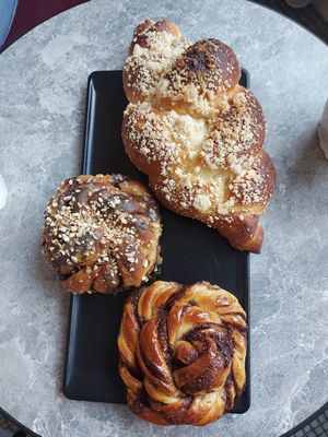 Some kind of cinnamon bun with Coffee and chocolate, Cardemom bun, and the big one idk what it was but everything was very good!🤩 at Zaczyn in Krakow