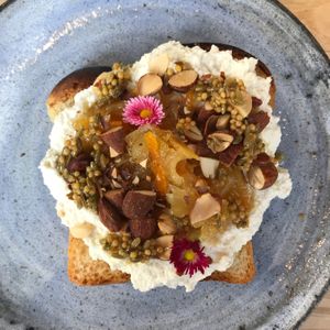 toast with vegan cottage cheese, homemade orange marmalade, nuts, mustard  at Zaczyn in Krakow