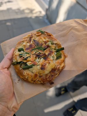 Savory bun with asparagus and almond feta at Zaczyn in Krakow