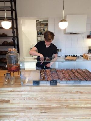 Sweet rolls made with: chocolate, peanut butter, hazelnuts and caramel, raspberries, lemon zest, and icing, apples, almonds, and caramel. Photo by Magda Łapińska at Zaczyn in Krakow