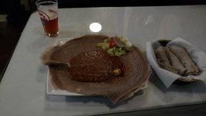 Red lentils with injera (and a beer) at Wonder Ethiopian in Seattle