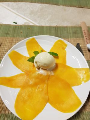 Mango with coconut ice cream at Hoa Nghiem in Hue