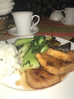 Cam Phan. This is rice with the best tofu, eggplant and greens. Very tasty sauce!!! at Hoa Nghiem in Hue