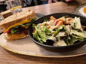 vegan burger. MUST GET. Had to sub bun for bread as they ran out but WORTH IT  at Karls Kraut in Luzern