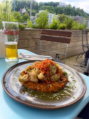 This sweet potato curry was amazing! And the local beer is great too! at Karls Kraut in Luzern