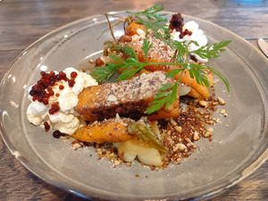 Tempeh on Tamari Vegetables with roasted hazelnuts at Karls Kraut in Luzern