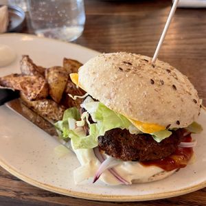 burger with wedges  at Karls Kraut in Luzern