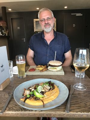 Tofu teriyaki and burger with fries  at Karls Kraut in Luzern