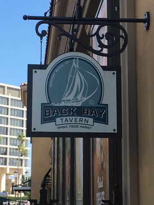 Sign by entrance at rear of store at Back Bay Tavern in Newport Beach