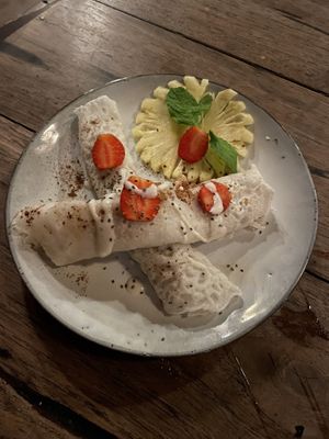 rice crepes with shredded coconut and palm sugar - my favourite thing we ate here!  at Dragonfly Cafe in Ubud