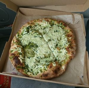 Daiya cheese on pesto (the pesto is not vegan) at Mod Pizza in Reno