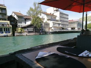 Outside sitting by the river Aare at V-mOnd in Thun