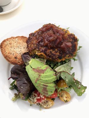 Lentil Pattie Burger with tomato, quinoa and avocado salad. at Lily's Pad Cafe in Leura