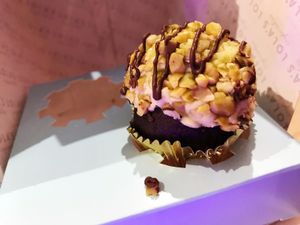 mini chocolate cupcake with cherry filling and nuts on top, this was soooooooo goood! at Lola's Cupcakes in Dartford