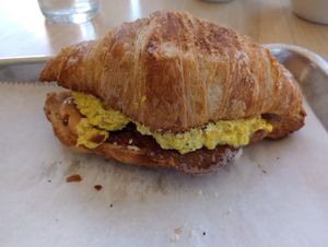 Vegan brunchy sandwich on croissant at The Sweet Praxis in Syracuse