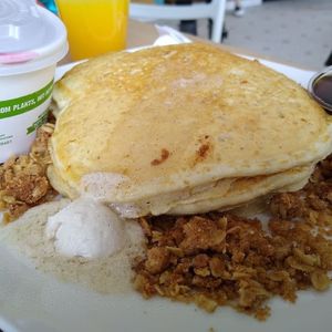 Triple berry pancakes with toppings on side at The Sweet Praxis in Syracuse