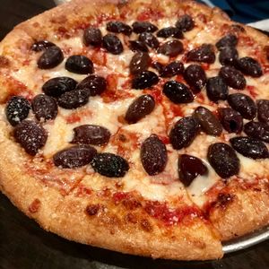Kalamata olive pizza (vegan cheese and crust available) at Tomato Bar Pizza Bakery in Valparaiso