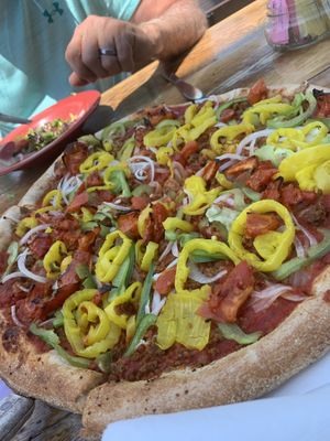 Tallahassee pizza without vegan cheese  at Tomato Bar Pizza Bakery in Valparaiso