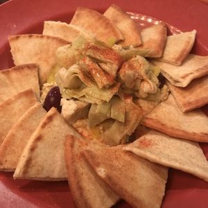 Hummus and Greek Olives, Add Artichokes  at Tomato Bar Pizza Bakery in Valparaiso