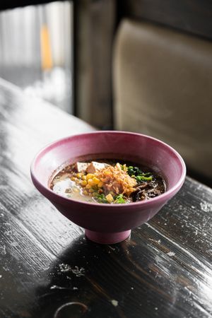 Our signature Creamy Vegan ramen comes with tofu, Shiitake mushrooms, greens, corn, and kale noodles at Ohyama Ramen in Whistler
