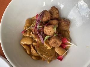 Large Plate - Fried Tofu Cassoulet with corona beans and house-made vegan Italian sausage. A must try! at Max Well in New Orleans