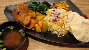 Dhum Briyani with curry potatoes, pumpkin, green vegetables. a free bowl of soup at AMK Hub - Vegetarian Stall in Northeast Singapore