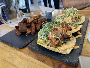 Taquitos + Bastones de camote  at Sapiens in Santiago