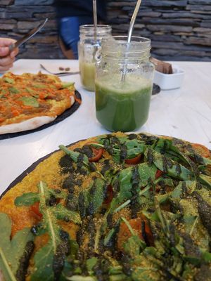 Our pizzas with the juices of the day at Sapiens in Santiago