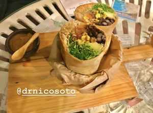 Burrito poroto negro y arroz integral  at Sapiens in Santiago