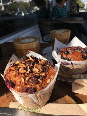 Vegan chocolate/raspberry and blueberry muffins + latte with coconut milk at George Cafe in Mount Maunganui