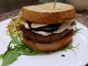 POLISH BURGER = "ground" in bread with home-made zucchini ketchup, mayonnaise, roasted beetroot and pickled cucumber at Sufeat in Krakow