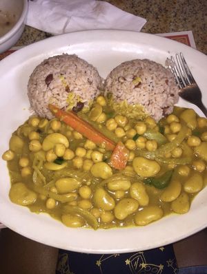 Curry chickpeas and butter beans!!! OMG my mouth is so happy.  at Coconutz Fusion Cafe in Miramar