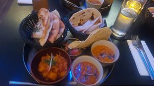 Vegan thali with garlic naan at Indiya in Wels