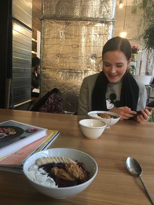 Plants, dogs, books, coffee in mini bowls - cute as heck at My Goodness in Berlin