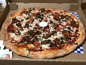 Vegan pepperoni, mushroom, and vegan meatballs at Bizza in San Francisco