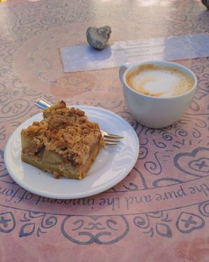 Apple pie and a cappuccino with oat milk at Maghaz Restaurant and Teahouse in Budapest