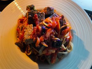 The vegan pasta - it doesn't look like a lot in the photo. But actually the plate is very deep and the portion was generous.  I brought my own tofu which they added. at La Silapa in Luang Prabang