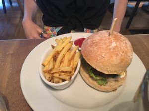 Crispy seitan fillet and avo burger with fries at Acanteen in Chelmsford