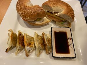Breakfast bagel sandwich with dumplings  at SaVeg Cafe in Calgary