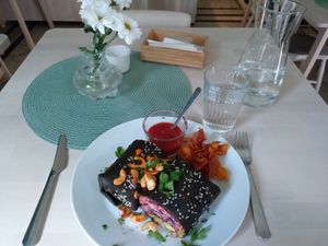 Summer gluten-free burrito with jackfruit, carrot, mango, avocado... Great combination! at Truefood Cafe in Lund