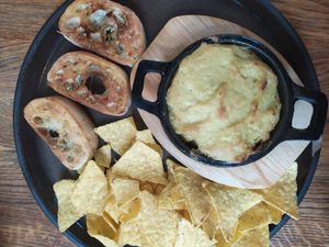Oven-baked "cheese" (tastes nice, but not like cheese). Made from cashews. at Froindlichst - Daimlerstr in Hamburg