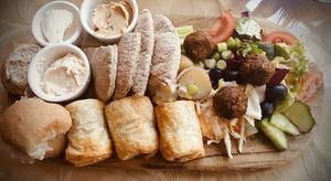 The Vegan Platter - 2x sausage rolls, 2x Falafel, hummus, mushroom pate, salad, butter & pita bread 😋   at The Green Cottage in Louth