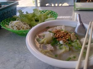 Huge noodle soup with tofu. Complimentary lettuce and sprouts to add to the soup. at LaungXaiKham Restaurant in Vang Vieng